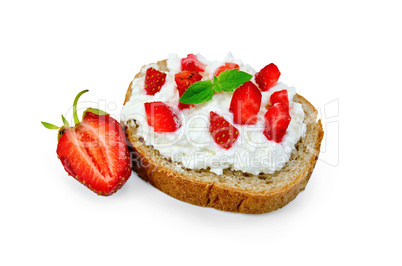 Bread with curd cream and berries of strawberries