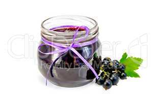 Jam of blackcurrant in a glass jar