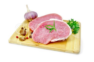 Meat pork slices with parsley and garlic