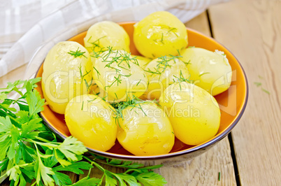 Potato boiled with parsley on the board
