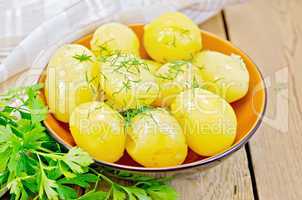 Potato boiled with parsley on the board