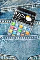 smartphone with a transparent screen in a pocket of jeans.