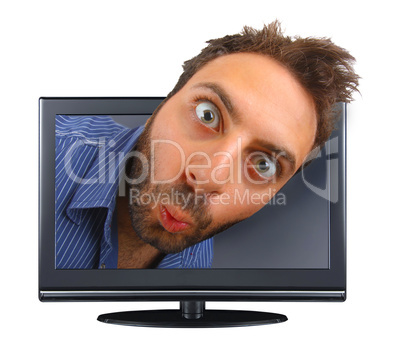 Young boy with a surprised expression in the tv