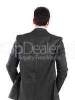 Young businessman turning his back to camera