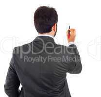 Young businessman turning his back to camera with pen