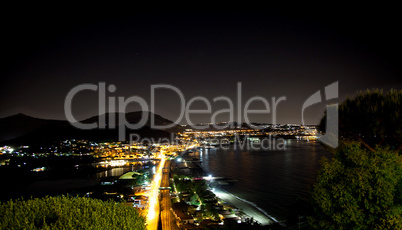 Night view of Baia bay, Pozzuoli, near Naples, Italy