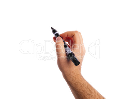 Hand holding a black marker with copy space.