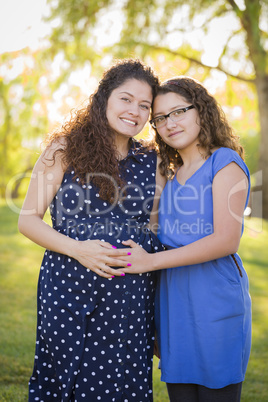Hispanic Daughter Feels Baby Kick in Pregnant Mother?s Tummy