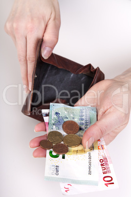 woman showing the contents of her purse