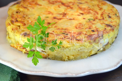Typical Spanish potato omelette on a table