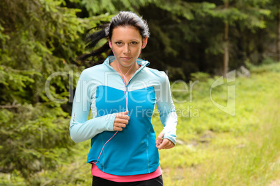 running woman in forest  fitness training