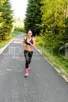 athlete woman training for running race outdoor