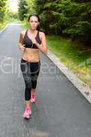 sportive woman running outdoor motion blur