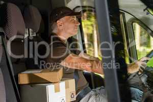 courier man driving cargo car delivering package