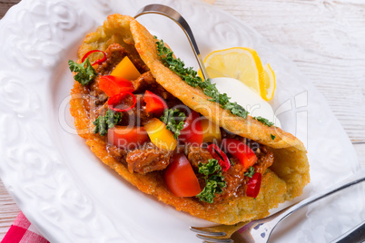 hungarian goulash with potato pancake