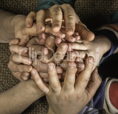 Many hands together