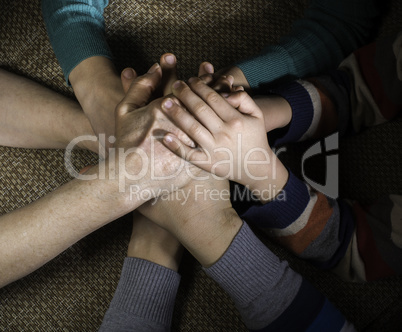 Many hands together