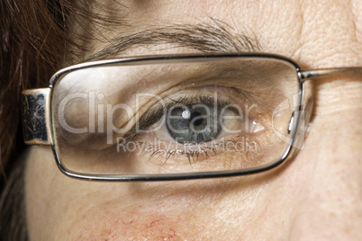 Close up old women eye and glasses