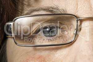 Close up old women eye and glasses