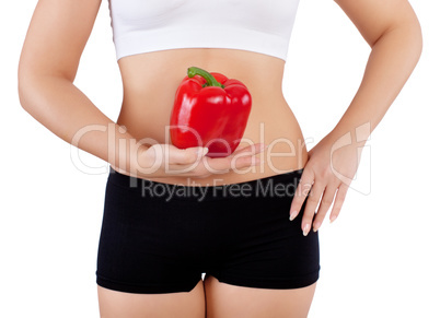 woman holding red bell pepper