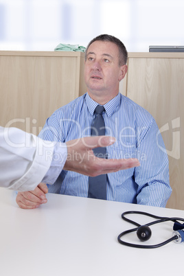 doctor talking with man in the hospital management