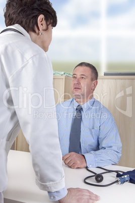 doctor talking with man in the hospital management