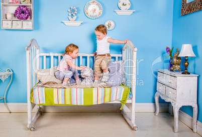 children on the bed