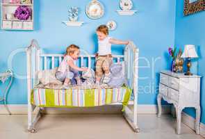 children on the bed