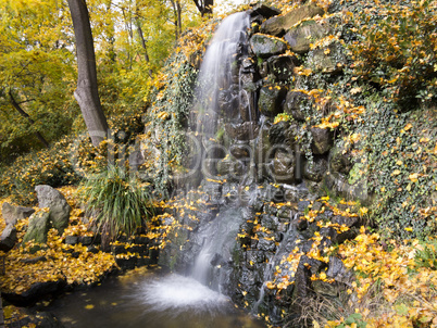 waterfall in the autumn park