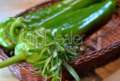 Green peppers in a wicker source
