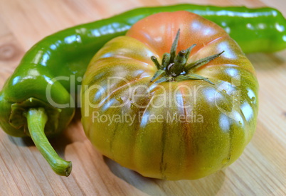Tomato and green peppers in a wicker source