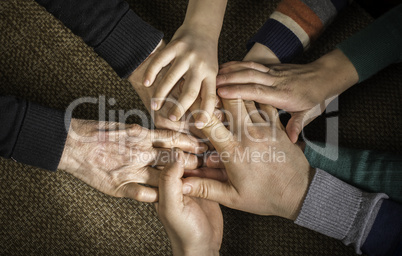 Many hands together