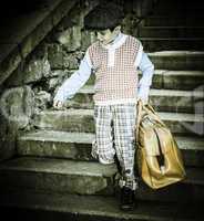 Exterior stairs and child with vintage bag