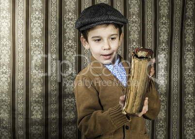 Child with red vintage book