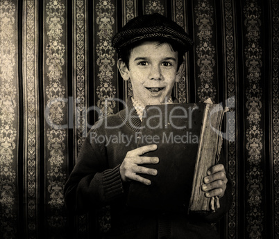 Child with red vintage book