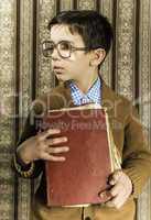 Child with red vintage book