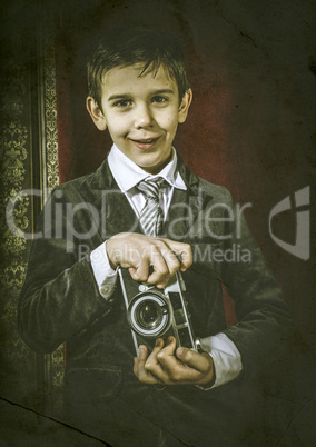 Child taking pictures with vintage camera