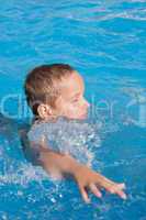 boy in swimming pool