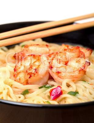 shrimp and noodle soup bowl with chopsticks