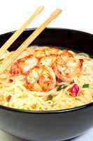 shrimp and noodle soup bowl with chopsticks