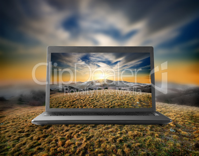 Mountains on a display of notebook