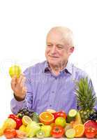 senior man holding apple