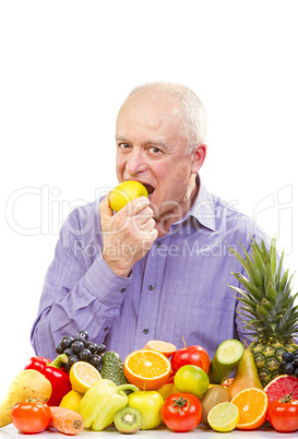 senior man eating a green apple