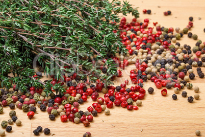 dry thyme with multicolored peppercorn