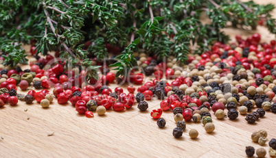 dry thyme with multicolored peppercorn