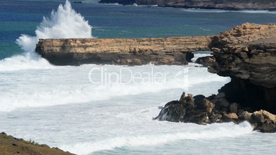 extreme big waves crushing on rough beach 11154