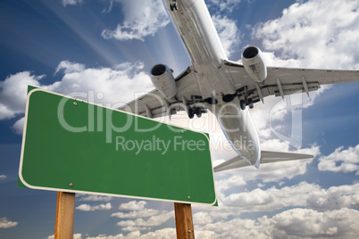 Blank Green Road Sign and Airplane Above