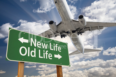 New Life, Old Life Green Road Sign and Airplane Above