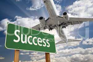 Success Green Road Sign and Airplane Above