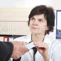doctor explaining patient's tablets